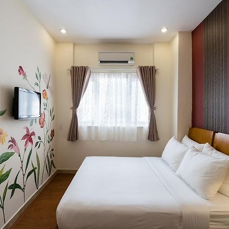 Asian Ruby Center Point Hotel & Spa Ho-Chi-Minh-Stadt Exterior foto